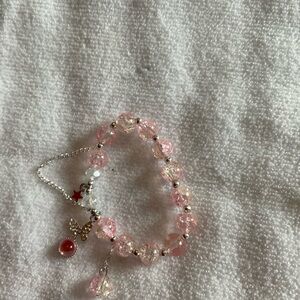 Charming Pink Beaded Bracelet with Charms